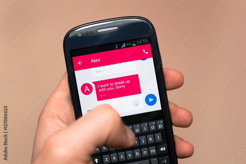Breakup - impersonal termination of love relationship through sending and receiving text sms message. Very shallow focus - focus on display Breakup - impersonal termination of love relationship through sending and receiving text sms message. Very shallow focus - focus on display
