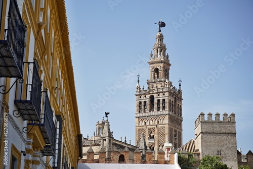 Giralda, famous bell tower of the Seville Cathedral in Spanish city of Sevilla, built as a minaret and rebuilt as a tower of famous church as a symbol of Arab and Moorish architectural period in Spain