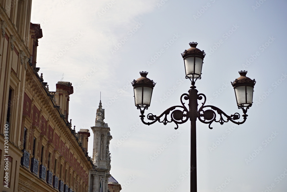 Typical Spanish decorated street lamp and lantern as a symbol of antiquated Spanish design and architecture