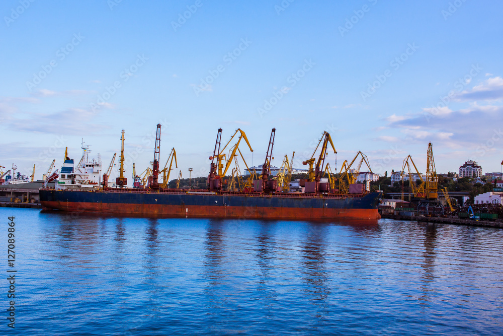 cargo ship loading in sea port