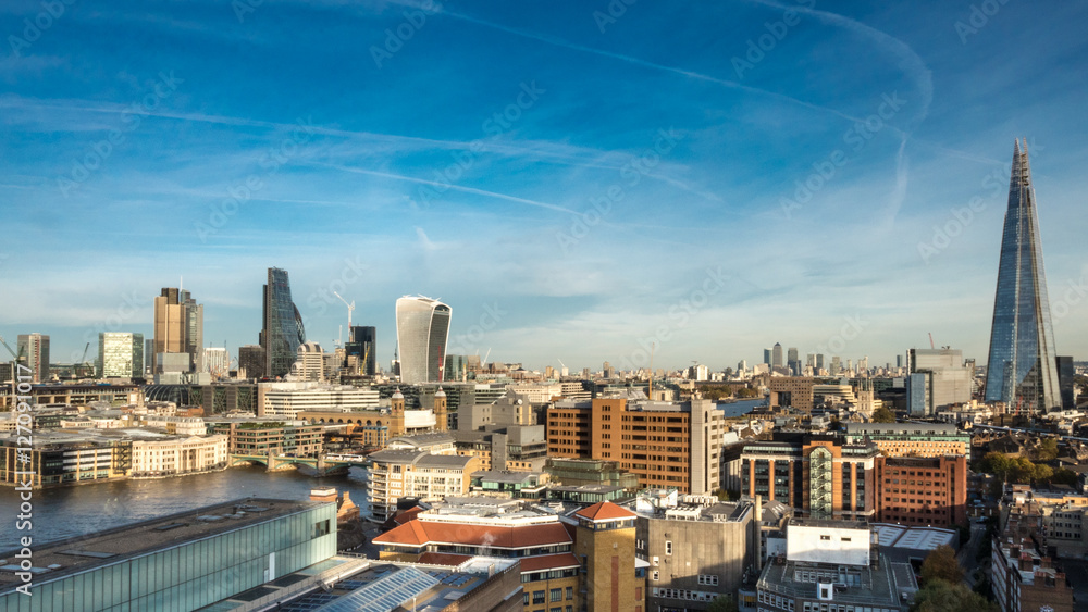 London Skyline. Wide angle panoramic view over the City of London, the River Thames and the iconic Shard skyscraper.