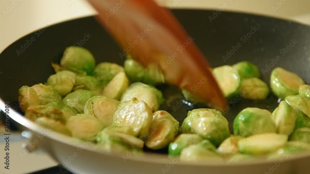 Brussels sprouts with bacon in frying-pan Brussels sprouts with bacon in frying-pan