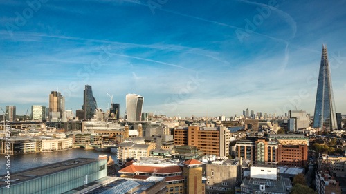 London Skyline. Wide angle panoramic view over the City of London, the River Thames and the iconic Shard skyscraper.