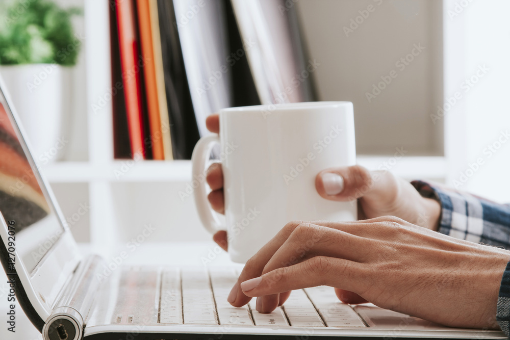 hands typing on the computer in the office hands typing on the computer in the office