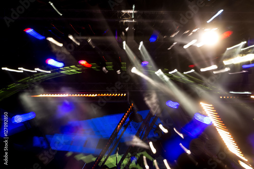 Defocused entertainment concert lighting on stage, bokeh