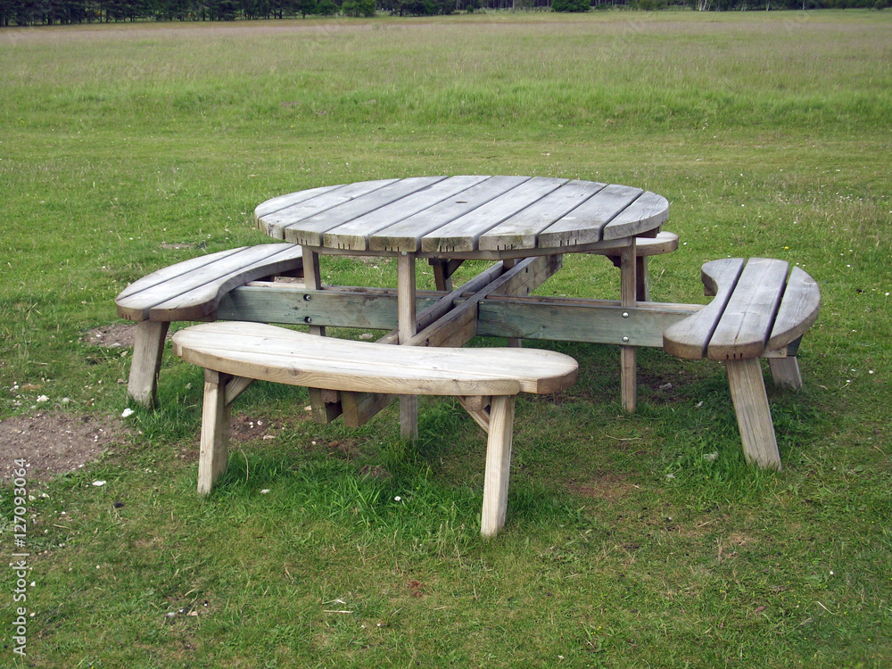 Round wooden picnic table