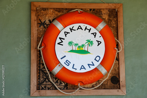 Life bouy on the wall at Makaha'a island near Tongatapu island i photo