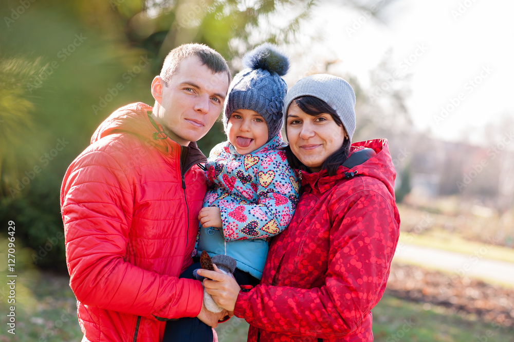 The family walks in the Park in autumn The family walks in the Park in autumn