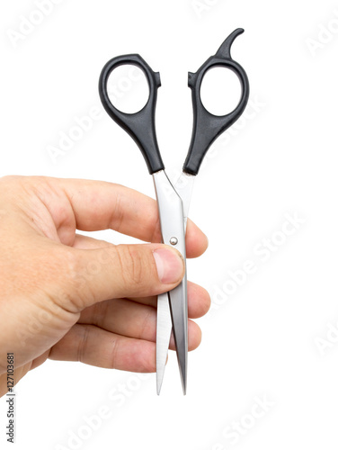 scissors in hand on white background