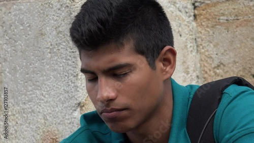 Sad And Unhappy Male Hispanic Teen