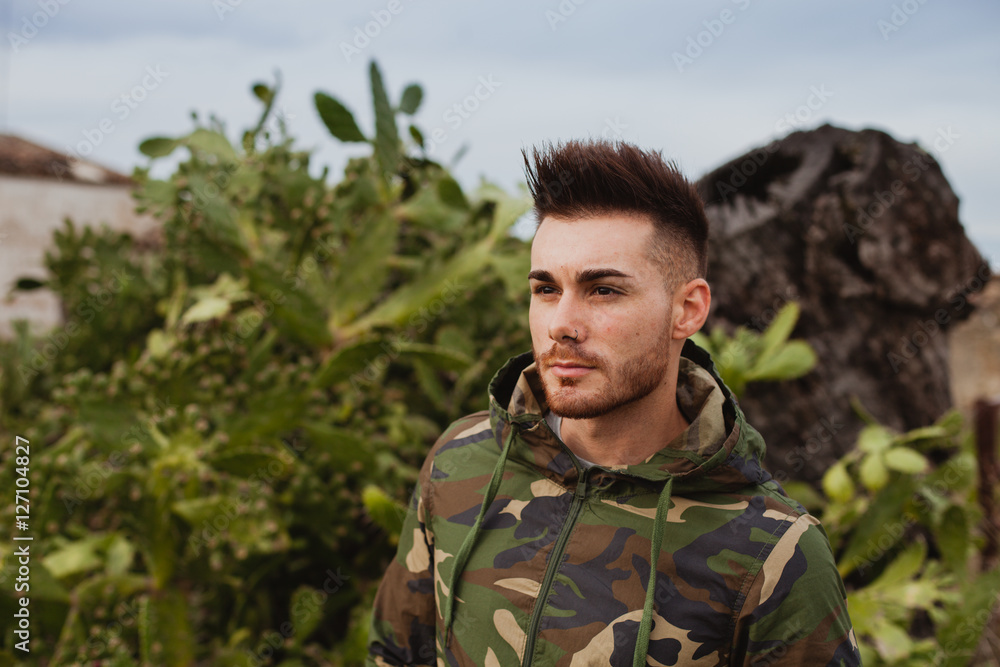 Attractive guy with military jacket Attractive guy with military jacket