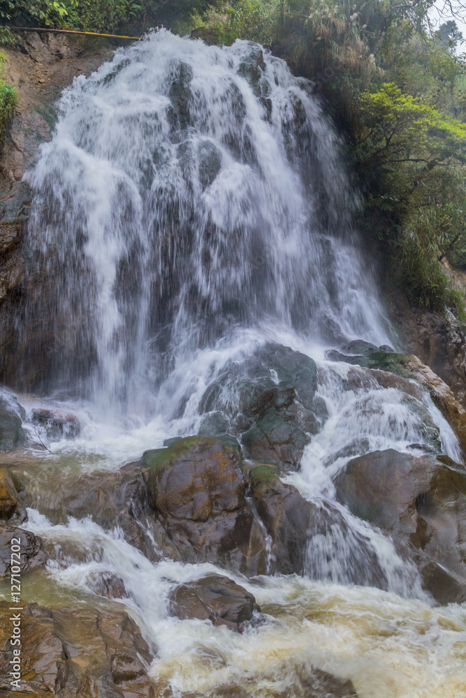 Naklejka premium Waterfall Tien Sa falls in Sapa Vietnam