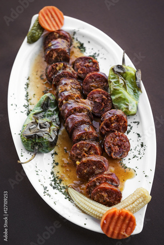 Portuguese spanish roast bbq grilled chourico chorizo spicy saus photo