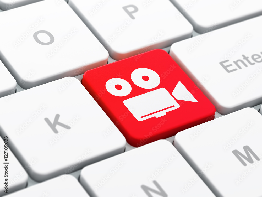 Travel concept: Camera on computer keyboard background Travel concept: Camera on computer keyboard background