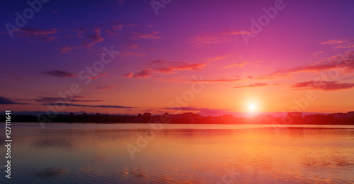 fantastic landscape, multicolor sky over the lake. majestic sunrise. use as background. color in nature. beautiful in nature. creative images. © jenyateua