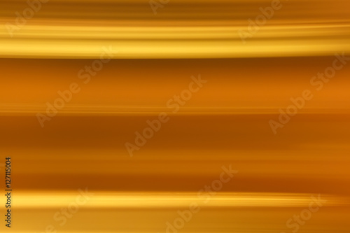 golden horizontal striped background, blurry