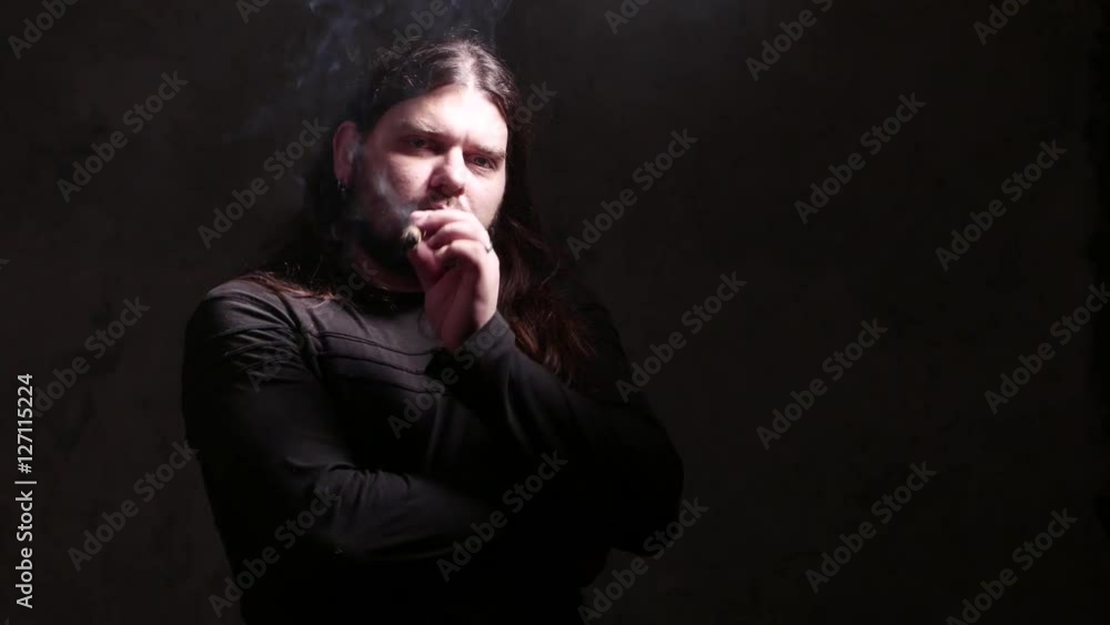 Man smokes cigar. 4K UHD Man smokes cigar. 4K UHD