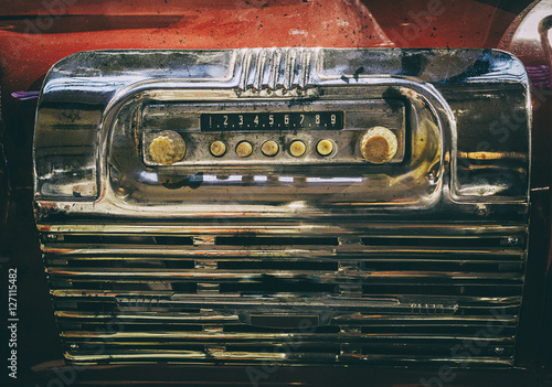 Old broken radio in retro bus.
