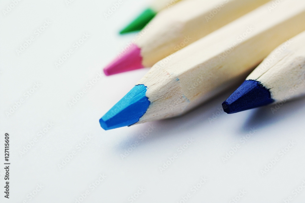 Colored wooden pencils on a white background Colored wooden pencils on a white background