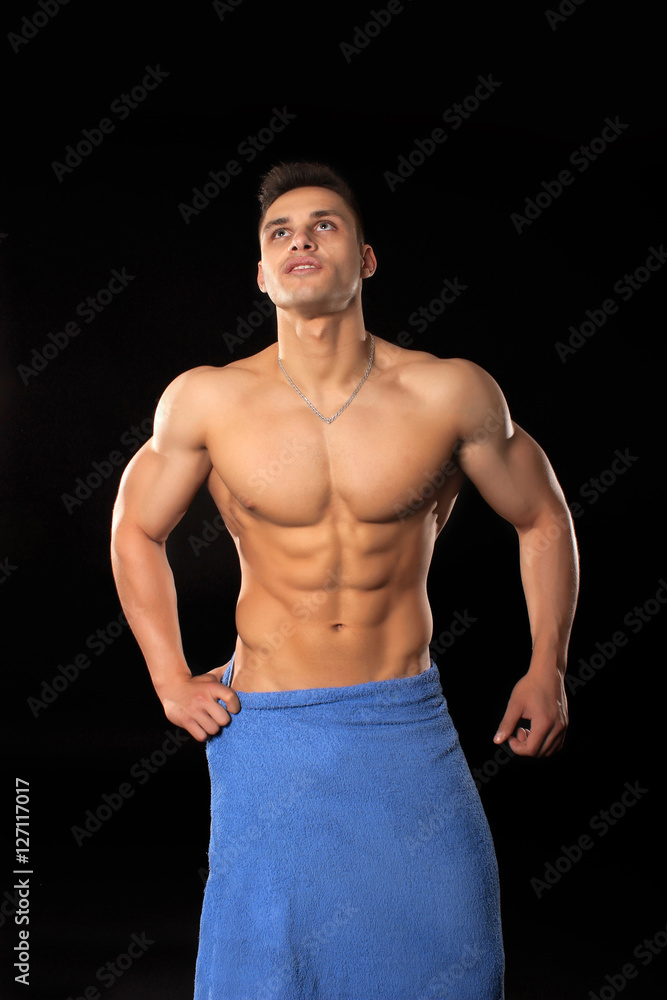 handsome bodybuilder man in shorts showing muscles handsome bodybuilder man in shorts showing muscles