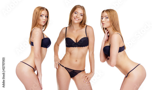 Sexy young blonde women posing in black underwear © Andrey_Arkusha