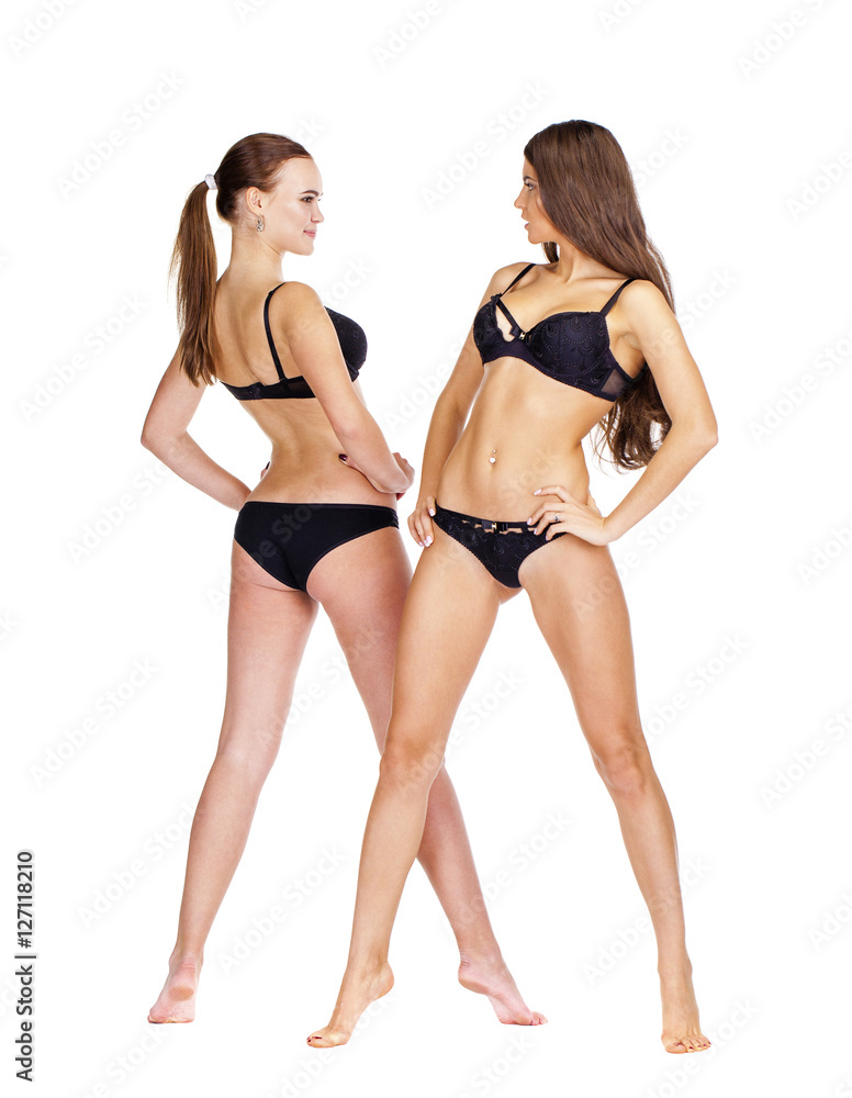 Two sexy models. Beautiful brunette women in underwear - obrazy, fototapety, plakaty 