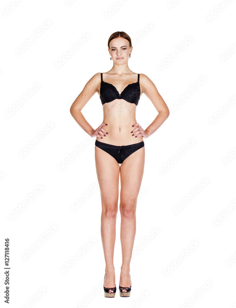 Full portrait of sexy lady in black lingerie, isolated on white Full portrait of sexy lady in black lingerie, isolated on white