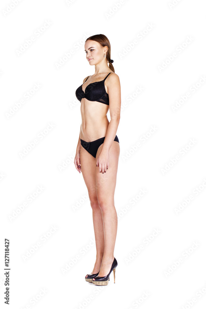 Full portrait of sexy lady in black lingerie, isolated on white Full portrait of sexy lady in black lingerie, isolated on white