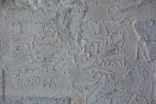 gray texture of plaster and brick