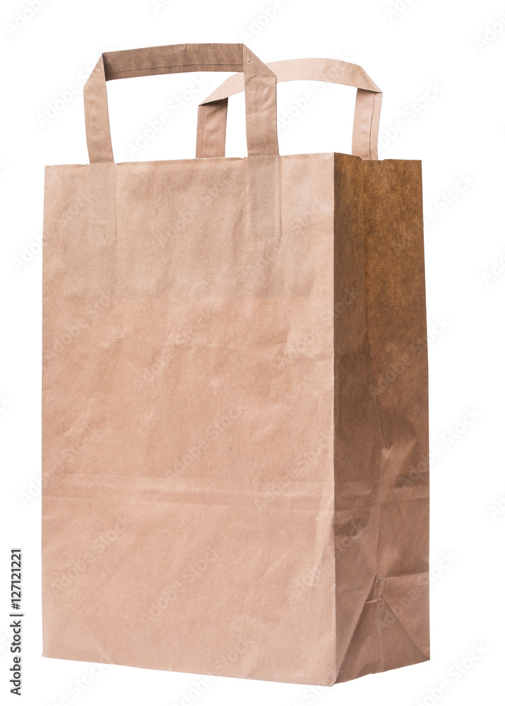 empty paper bag from the store is isolated on a white background in macro lens shot empty paper bag from the store is isolated on a white background in macro lens shot