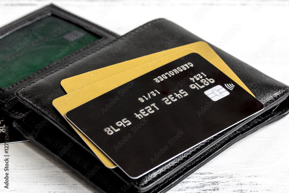 Credit cards on wooden background - online shopping Credit cards on wooden background - online shopping