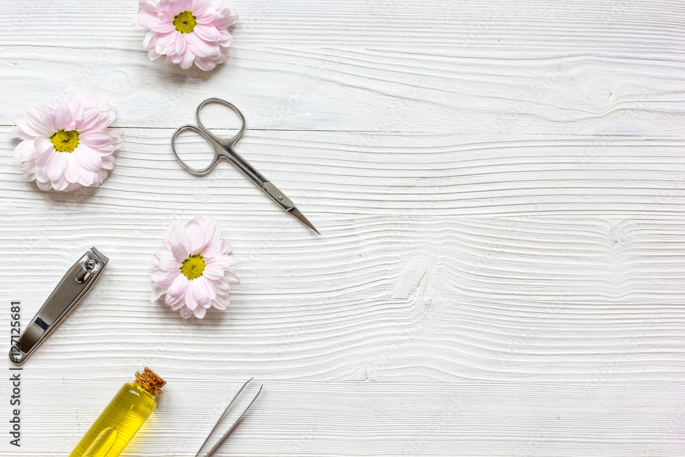 care of nails and cuticle on wooden background top view care of nails and cuticle on wooden background top view