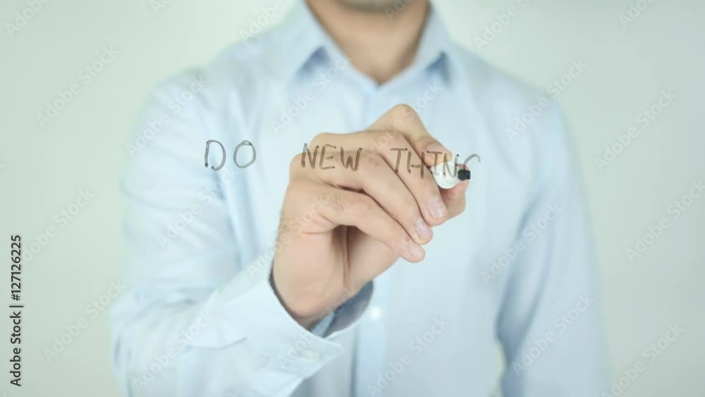 Do new things everyday, Man Writing on Screen Do new things everyday, Man Writing on Screen