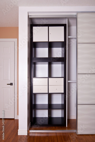 Built-in closet with sliding door shelving storage organization