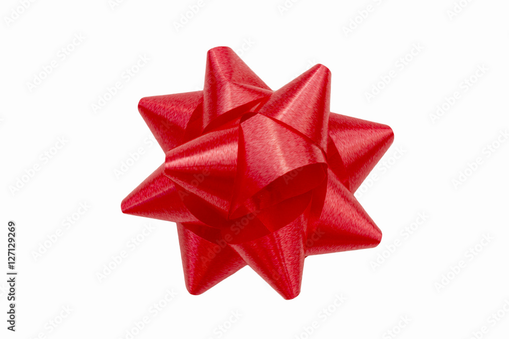Red holiday gift bow from above isolated on white background Red holiday gift bow from above isolated on white background