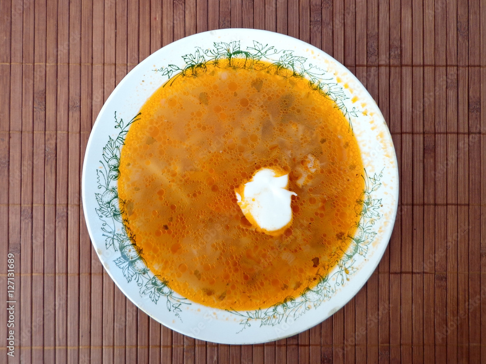 Meat soup in the bowl on the table Meat soup in the bowl on the table