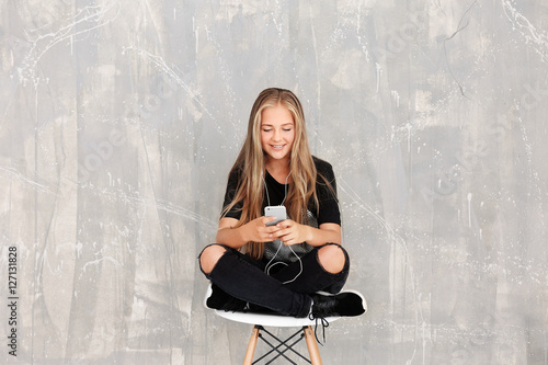 Cheerful teenager girl list...