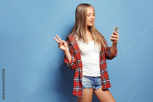 Beautiful teenager girl usi...