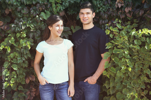 Young couple on green leave...