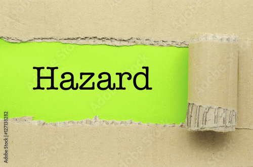 Torn Paper with word Hazard