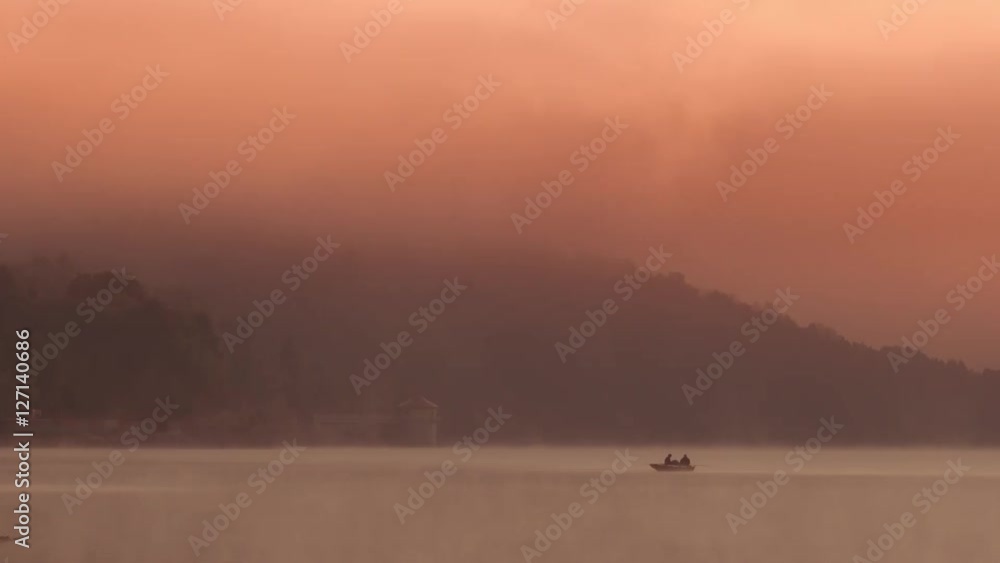 Fog over lake near the mountain. Fog over lake near the mountain.