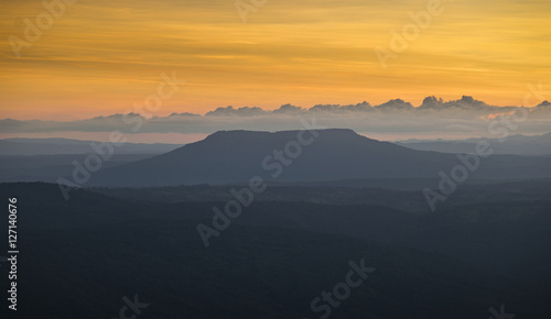 panoramic view of mountain during sunset with beautiful orange s