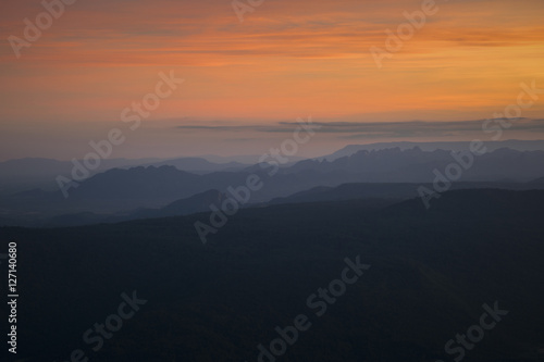 panoramic view of mountain during sunset with beautiful orange s © 9tiw