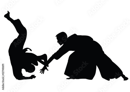 Silhouette of Aikido masters, leading the fight in training