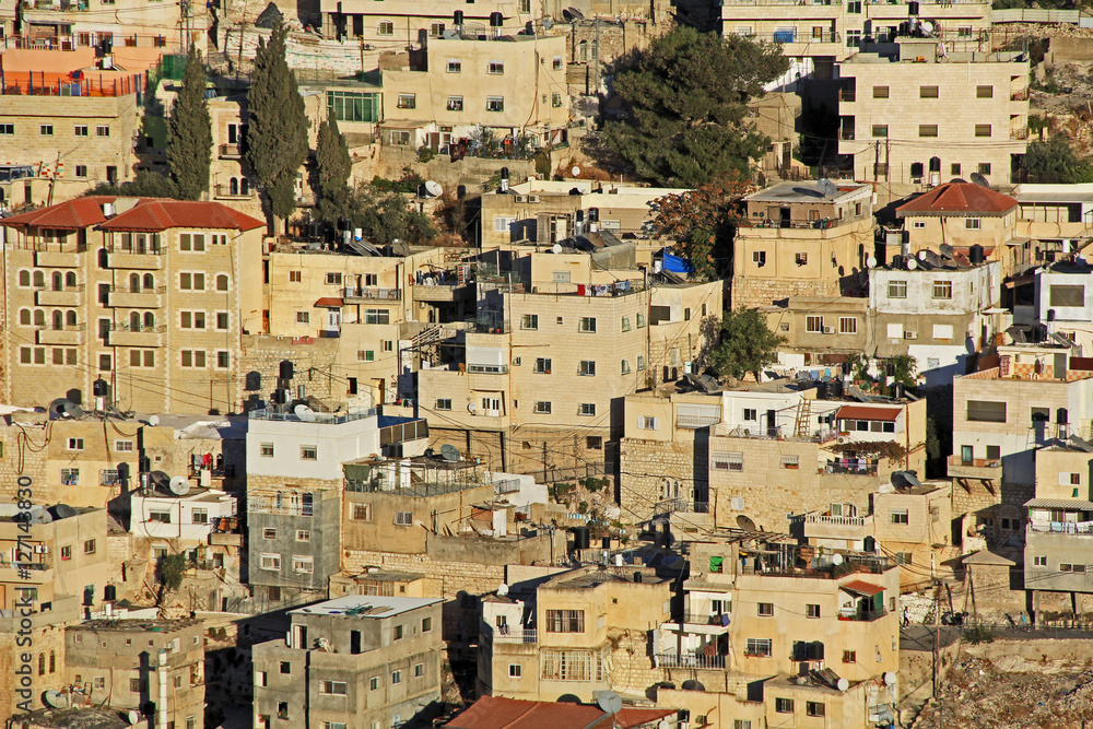 Homes on a hillside in Israel as seen from near the old city of Jerusalem. Homes on a hillside in Israel as seen from near the old city of Jerusalem.