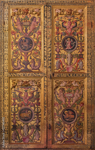 AVILA, SPAIN, APRIL - 18, 2016: The plateresque decorative door in the sacristy of Catedral de Cristo Salvador by Cornelius de Holanda from 16. cent. with the symbolic of the Four Evangelists.
