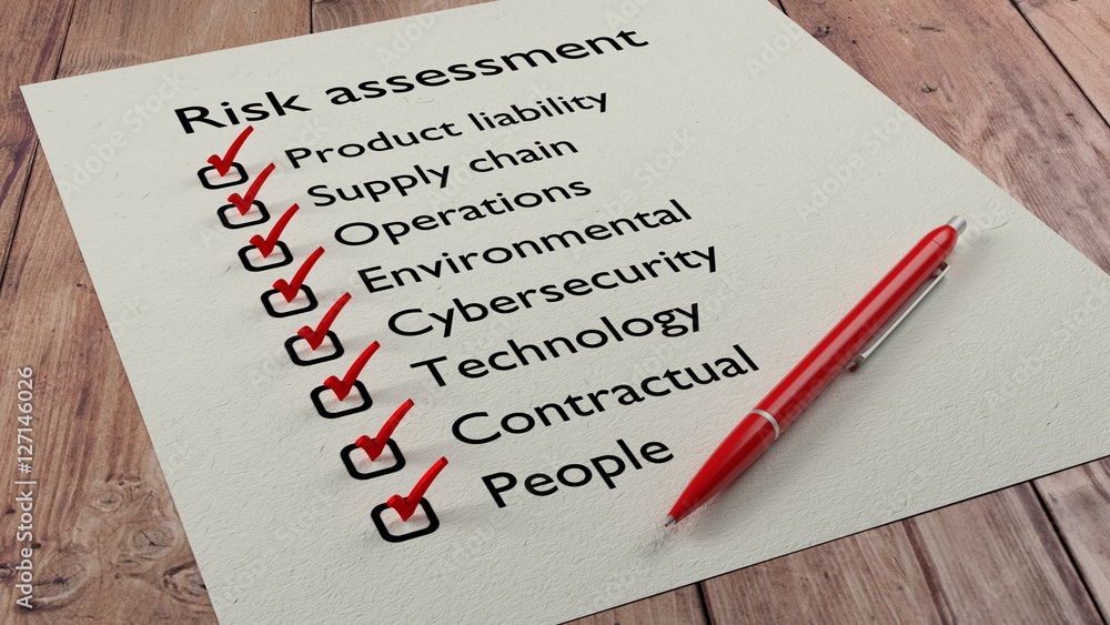 Risk assessment checklist with red pen and paper Risk assessment checklist with red pen and paper