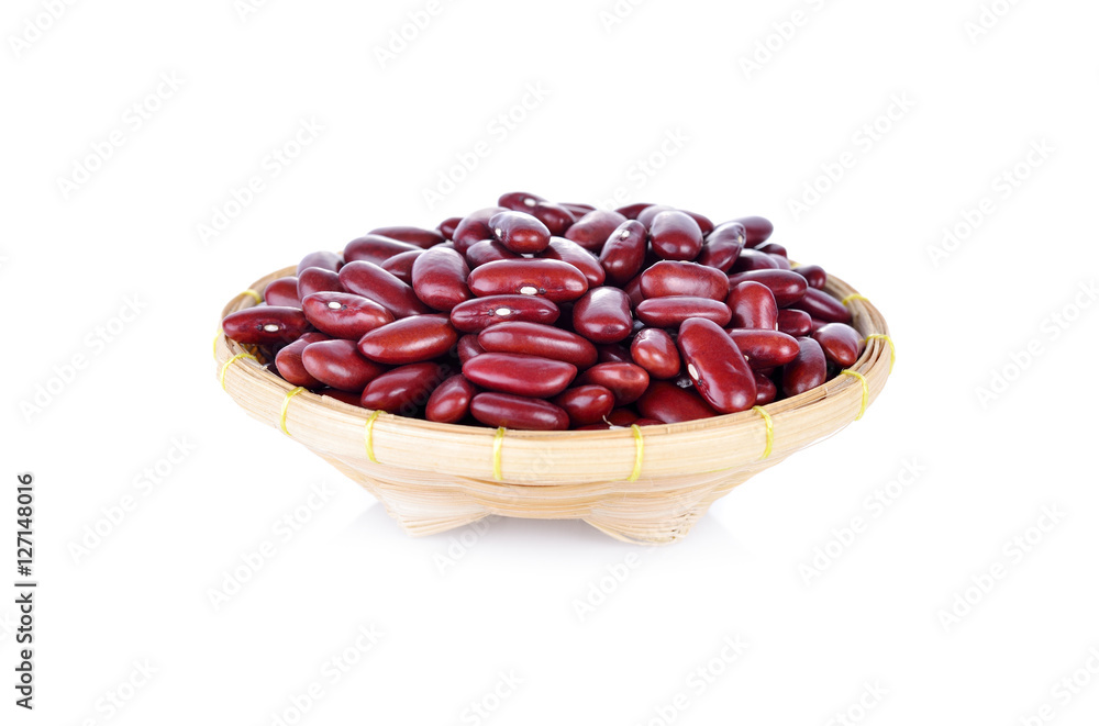 uncooked red beans in bamboo basket on white background uncooked red beans in bamboo basket on white background