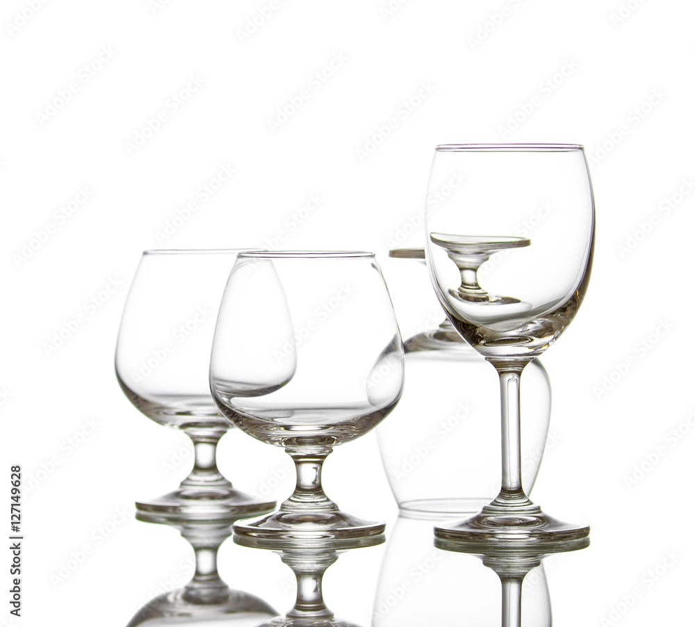 Empty crytal wine glasses, shot on white isolated. Empty crytal wine glasses, shot on white isolated.
