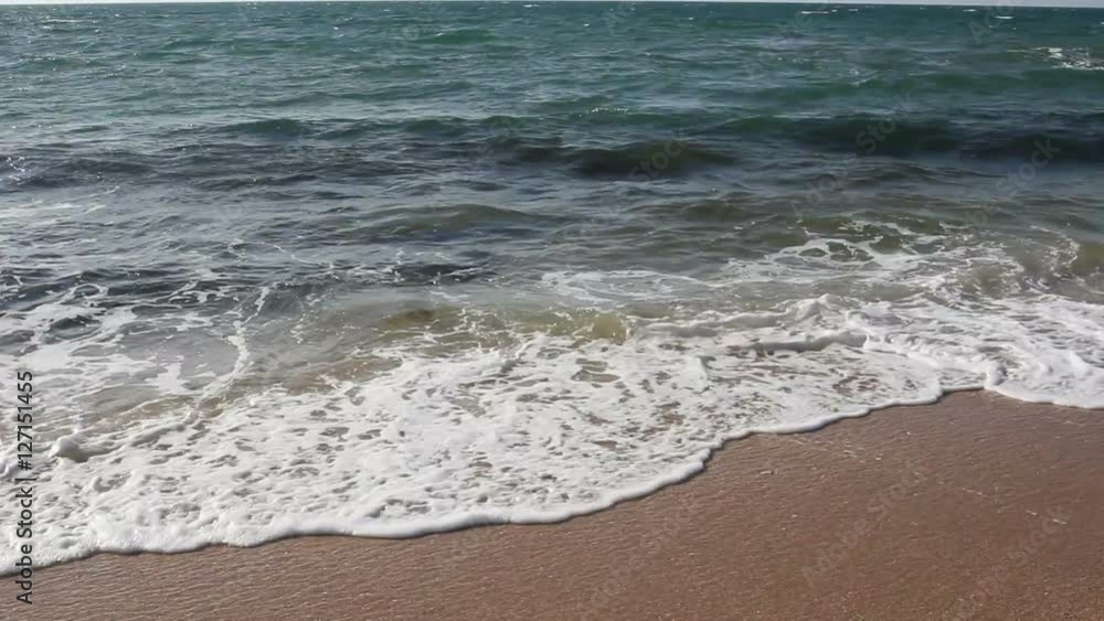 Soft wave of blue ocean on sandy beach. Soft wave of blue ocean on sandy beach.